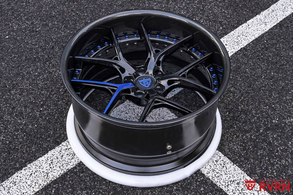 RVRN RV-DR08D Dodge Challenger rims in gloss black with a single blue spoke accent, 20x9.5 front and 20x11 rear, custom forged fitment
