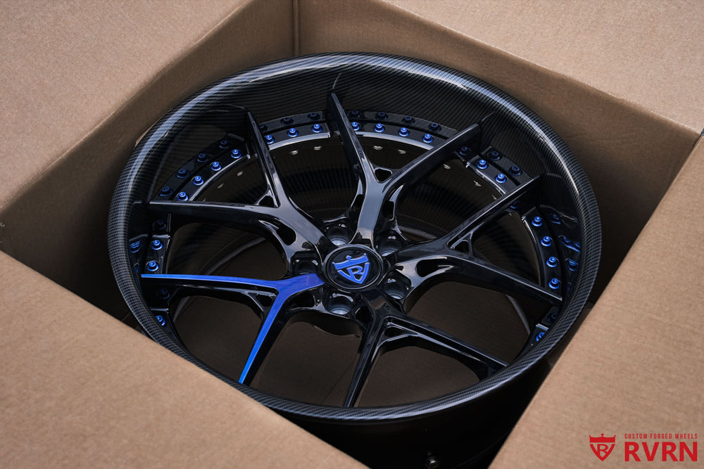 RVRN RV-DR08D Dodge Challenger forged wheels featuring a Y-spoke deep dish design with gloss black finish and single blue spoke accent