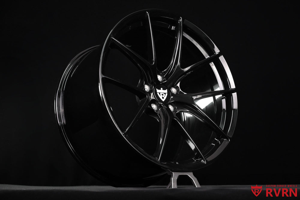 Custom Ferrari wheels by RVRN RV-MF11 with a one-piece forged Y-spoke concave design, all gloss black finish and staggered 20-inch fitment