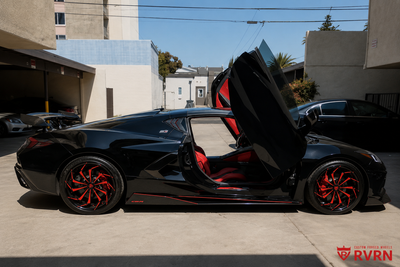 Side view of David P's 2020 Corvette C8 Stingray on RVRN RV-DC06 aggressive directional custom forged 2-piece wheels in gloss black and red, 19x8.5 front and 20x11 rear.