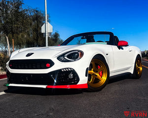 2020 Fiat 124 Abarth on RVRN RV-MJ010 monoblock 5-spoke custom forged wheels in Brushed Dark Gold, front three-quarter view with red Brembo calipers visible through the spokes.