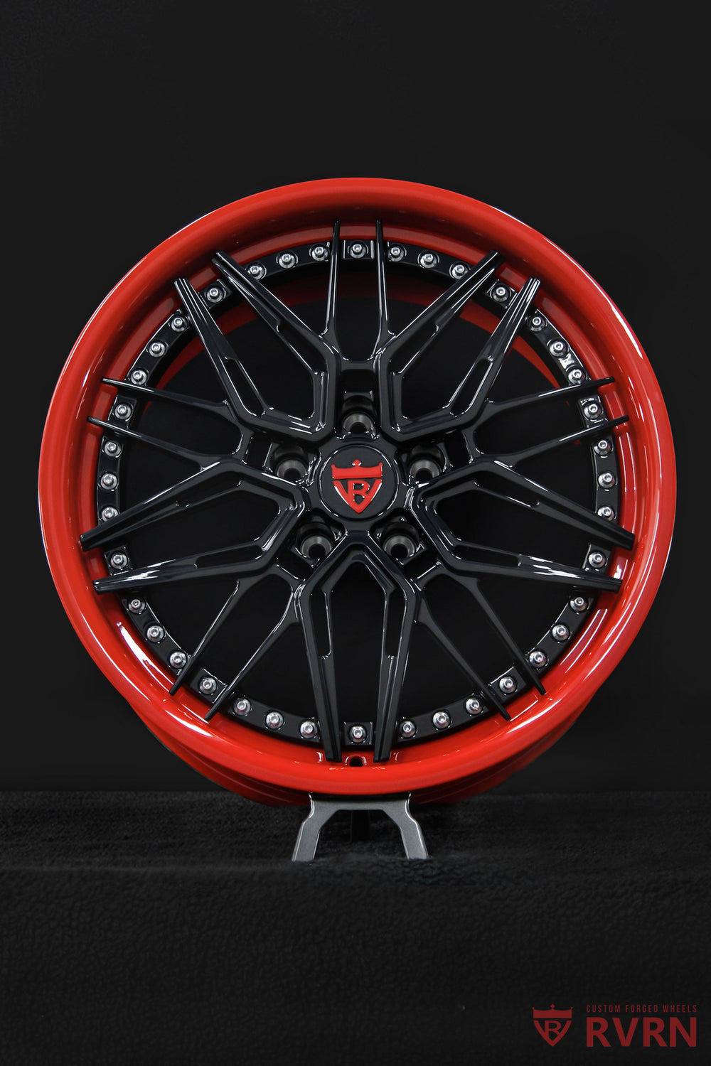 Front three-quarter view of a 2021 Chevrolet Corvette Stingray Z51 on RVRN RV-C081 2-piece forged Corvette C8 Stingray wheels in Gloss Black spokes and Gloss Red barrels, 19x8.5 front and 20x11 rear.