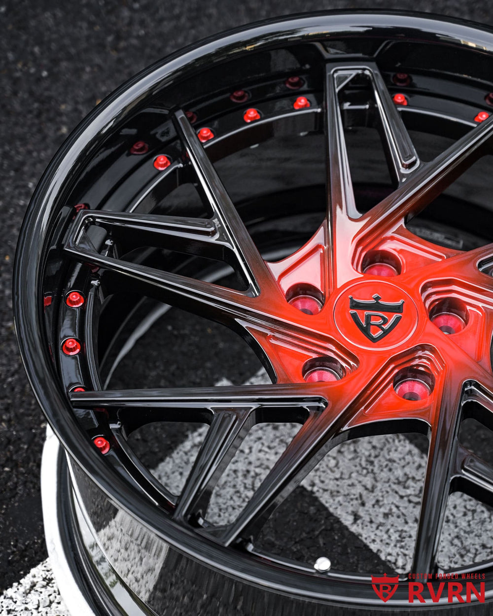 Close-up of Corvette C8 custom wheels RV-DS74 featuring gloss red spokes and gloss black outer barrel for aggressive street fitment