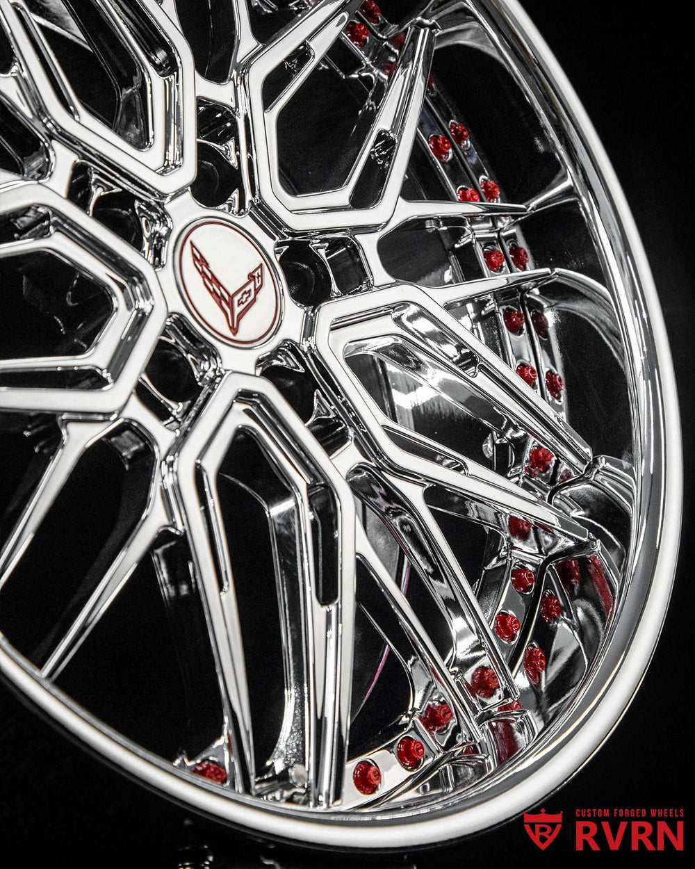 Side angle view showing chrome finish forged wheels fitment on 2021 Corvette C8