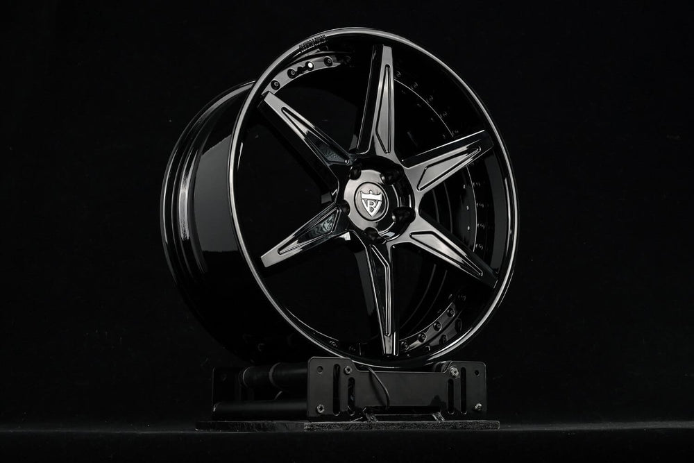 Gloss black concave five-spoke RVRN RV-DC19 forged wheel on a studio stand, custom wheels for the 2021 Dodge Durango SRT Hellcat