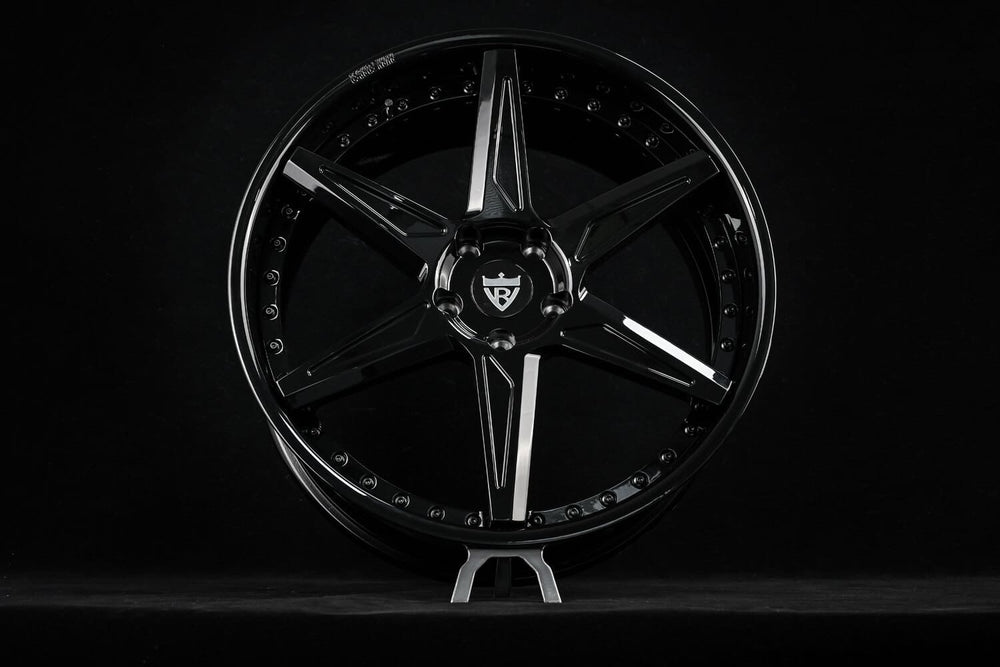 Gloss black five-spoke RVRN RV-DC19 forged wheel with a polished lip on a dark studio background, custom wheels for the 2021 Dodge Durango SRT Hellcat