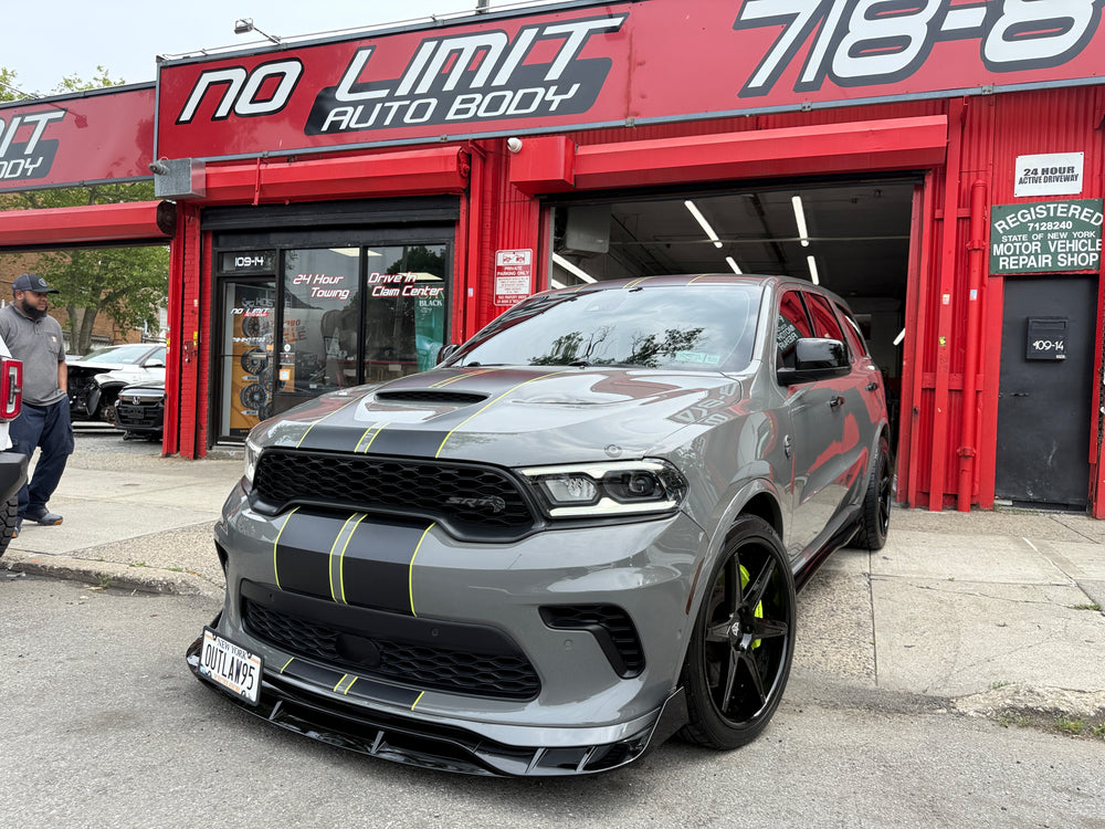 Grey 2021 Dodge Durango SRT Hellcat with black stripes on Gloss Black RVRN RV-DC19 forged wheels, front three-quarter view