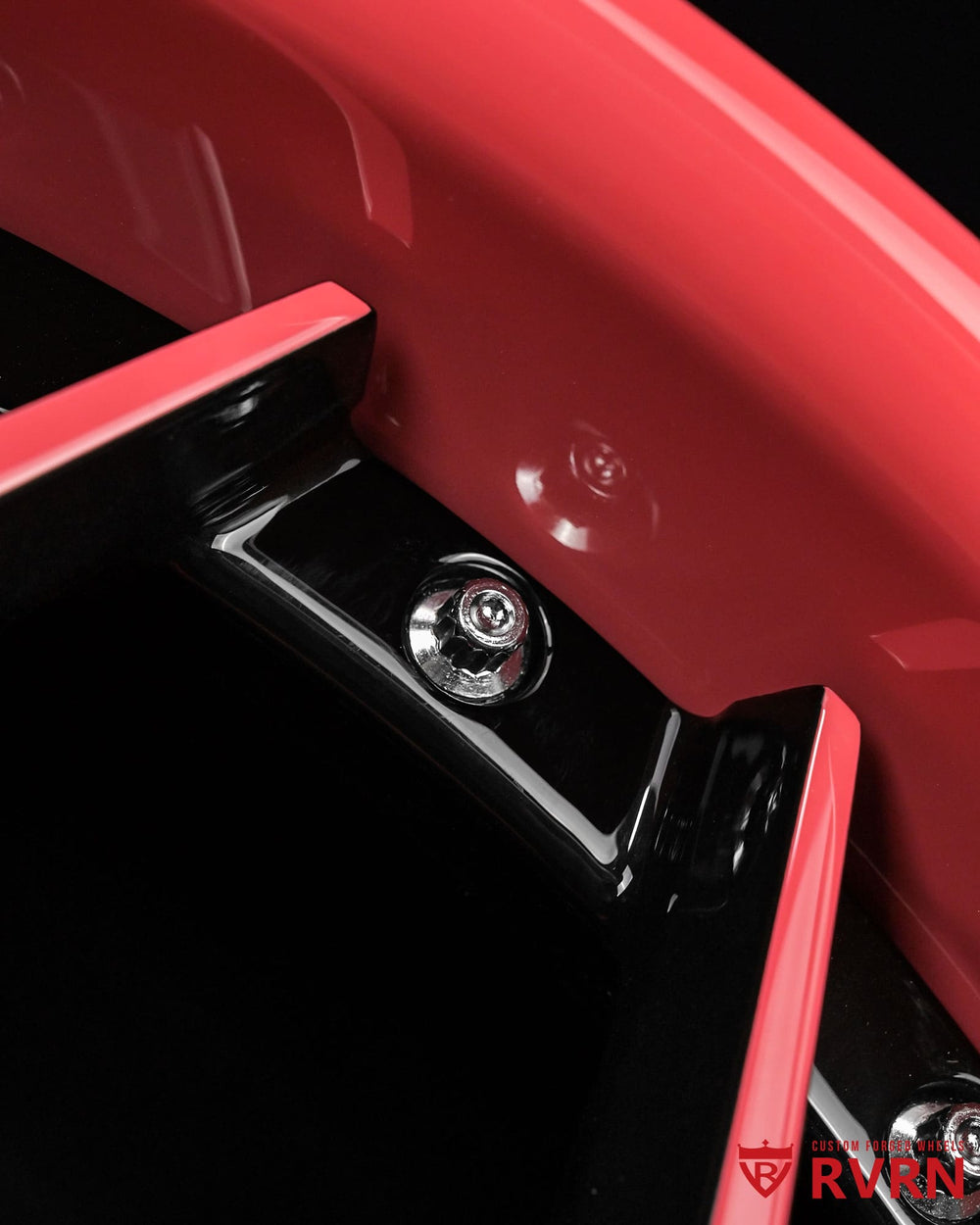 Close up of custom pink rims for Jeep Wrangler featuring premium forged construction and gloss black outer barrel by RVRN Wheels