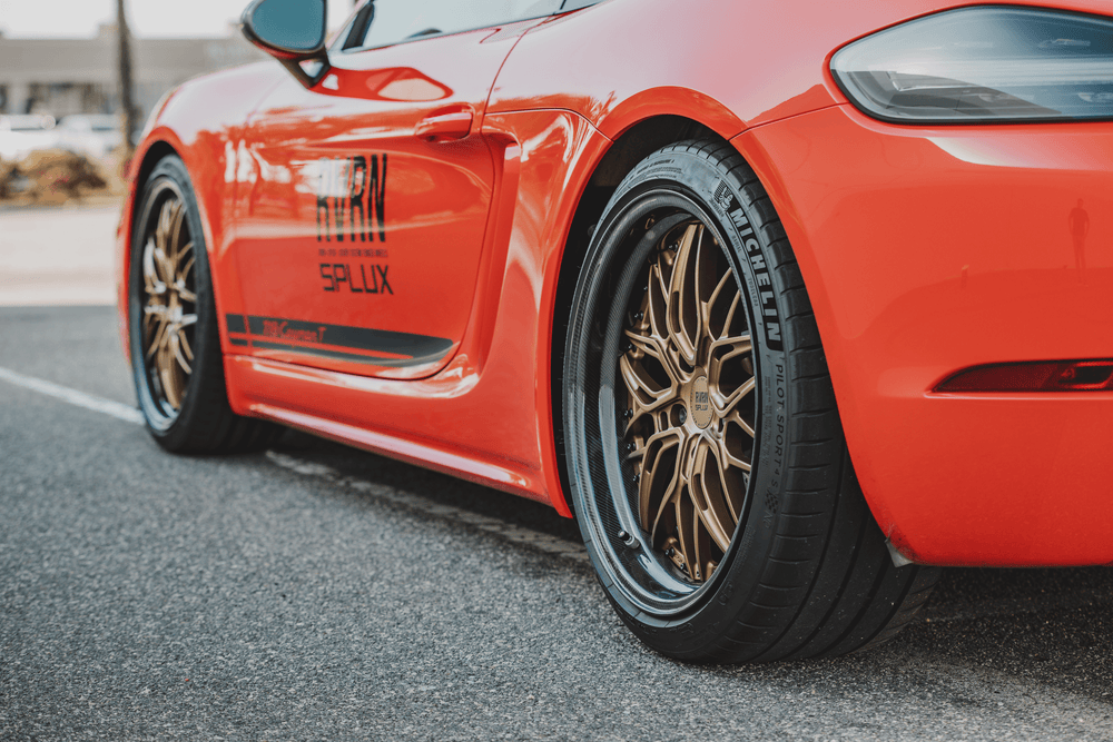 2021 Porsche Cayman T with forged two-piece matte bronze wheels side view