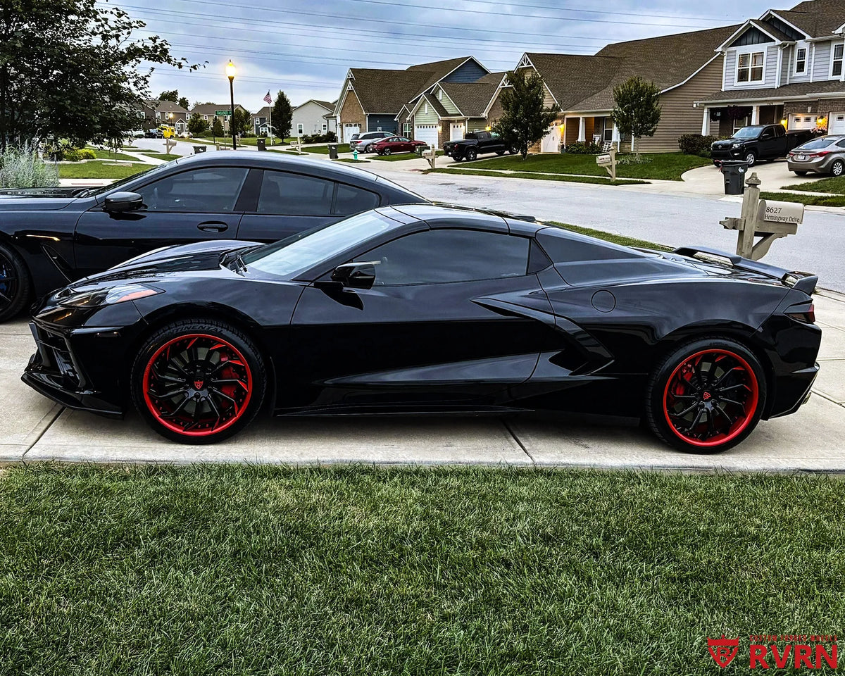 2021 Corvette C8 Stingray on RVRN RV-DC01 2-piece forged wheels with gloss black spokes and gloss red barrels, side view.