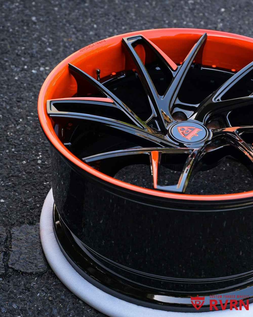 C8 Corvette custom wheels featuring striking orange and black rims, perfect for enhancing a C8 Sebring Orange exterior.