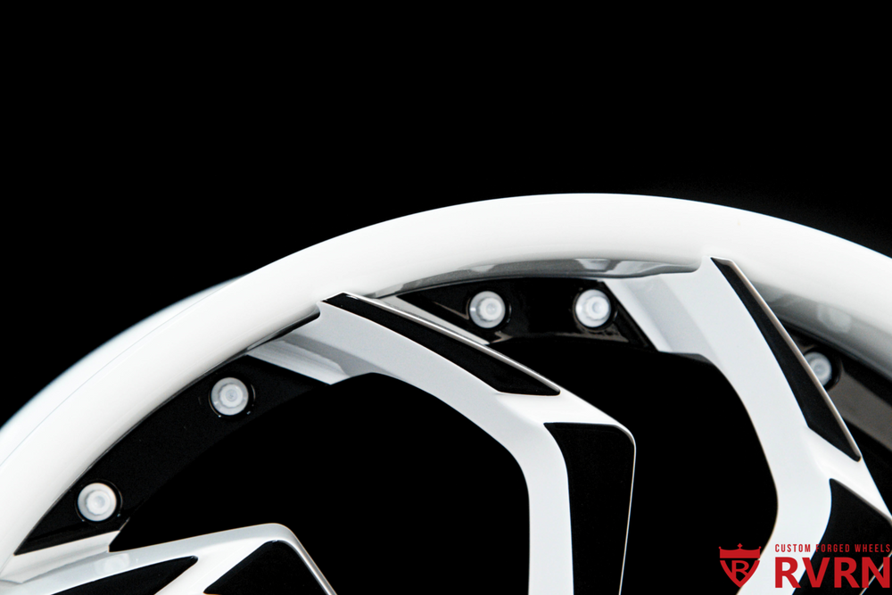 Rear view of 2021 Corvette C8 Z51 with custom black and white forged wheels