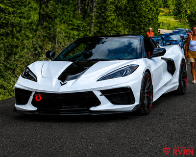 2021 Corvette C8 Z51 on RVRN RV-MS808 custom forged wheels in Gloss Black Spoke with Crystal Burgundy Barrel, front view at outdoor car meet.