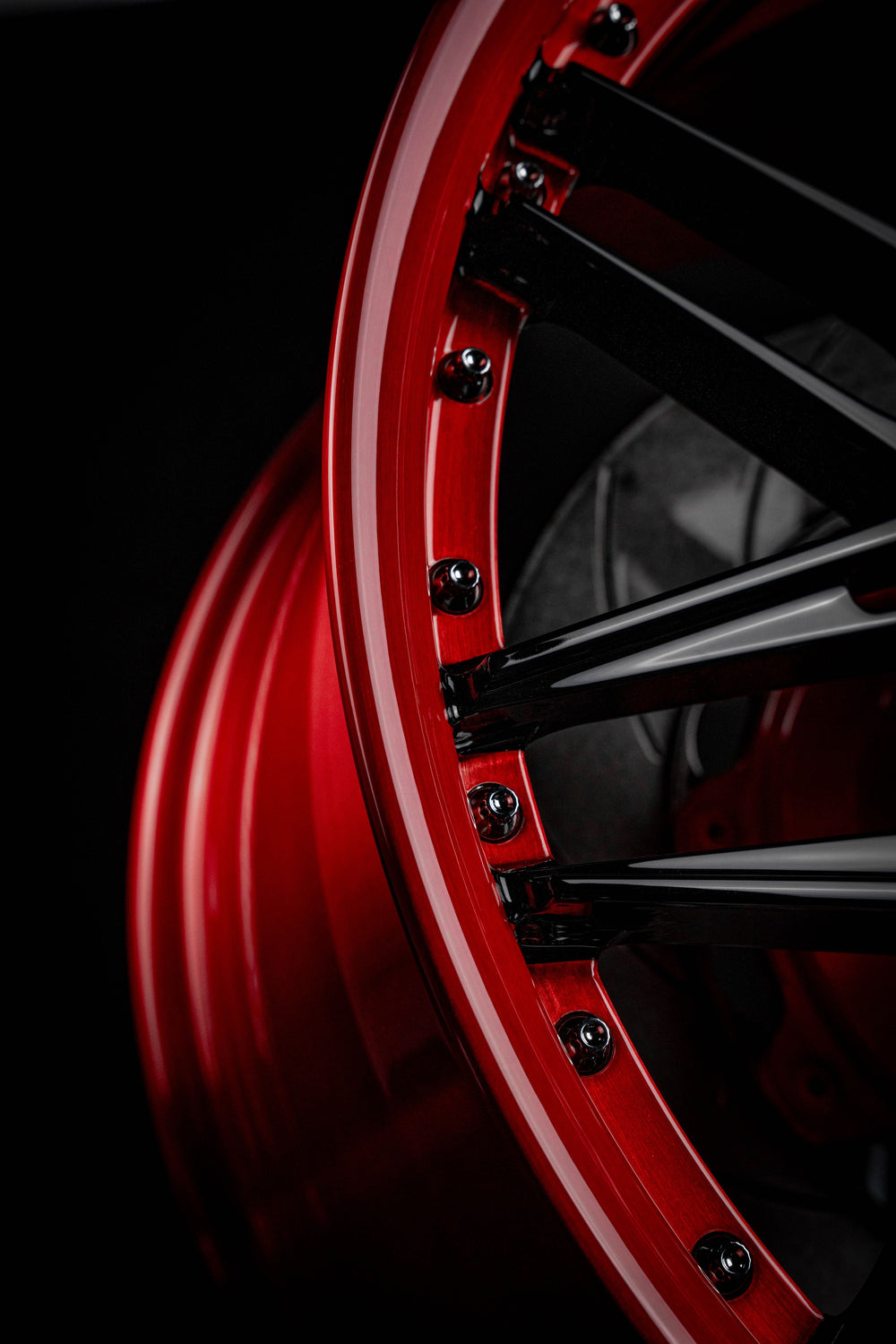 Close-up of red and black custom forged wheels for 2021 Ford Shelby GT500 by RVRN Wheels