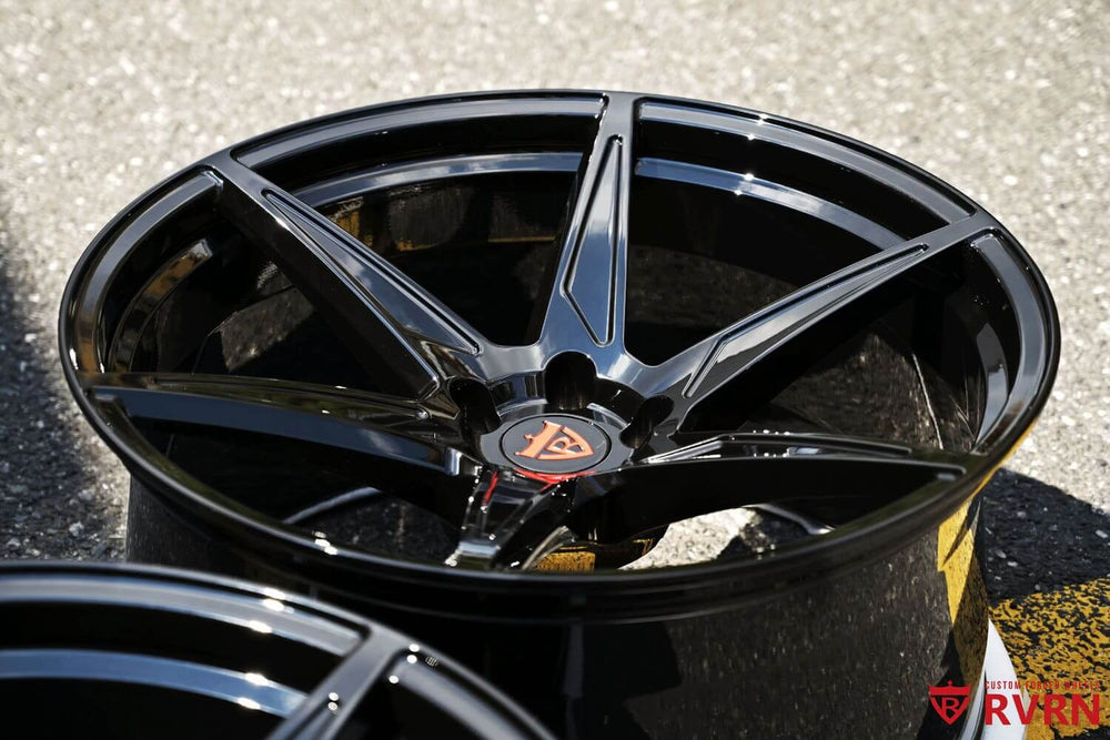 Front angle shot of black 22x11 forged wheels on 2022 Charger SRT