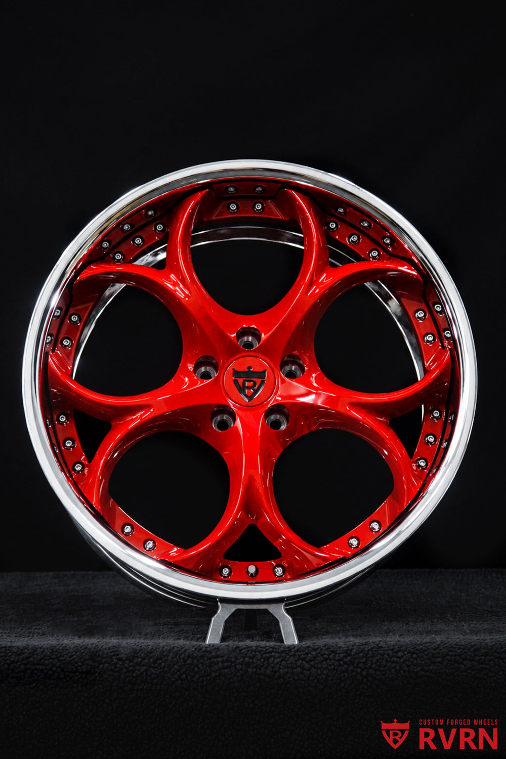 Detail view of chrome barrel and gloss red spoke Genesis G70 wheels designed by RVRN Wheels for a bold custom appearance.