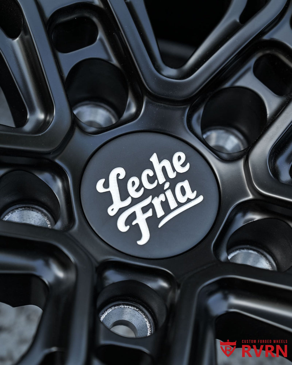Close-up detail of RVRN RV-C081 forged Tesla wheel with matte black finish and carbon fiber wrapped outer lip