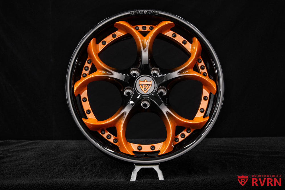 Front view of RVRN RV-DS016 custom C8 Stingray forged wheels in gloss black and orange, 19x8.5 +38MM front fitment