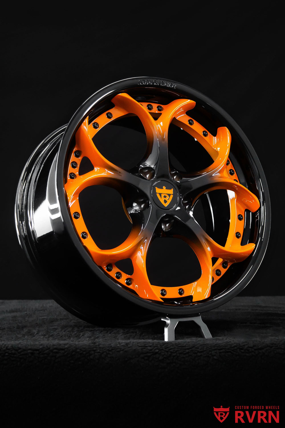 Side view of a 2022 Corvette C8 Stingray fitted with RVRN RV-DS016 custom forged wheels in gloss black and orange, 19x8.5 front and 20x11 rear