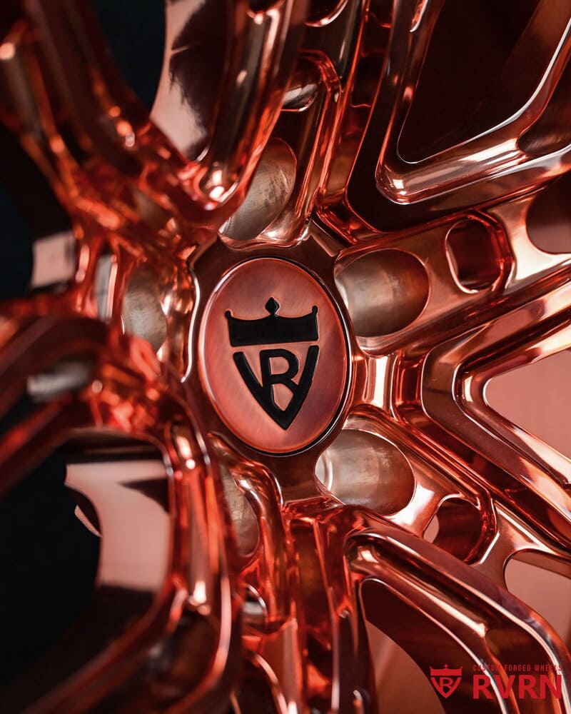 Front view of custom 2-piece polished rose gold Hellcat rim