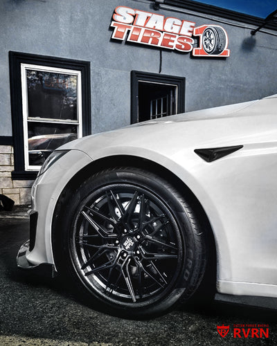 Wheel close-up of a 2022 Tesla Model S on RVRN RV-C081 carbon fiber lip wheels with matte black spoke and barrel finish.