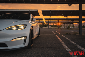 Front sunset view of a 2022 Tesla Model S on RVRN RV-C081 matte black carbon fiber lip custom forged wheels.