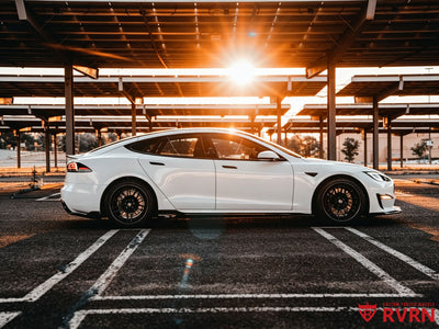Side sunset view of Willie Paul De Jesus's 2022 Tesla Model S on RVRN RV-C081 custom forged monoblock wheels with matte black spoke and barrel and carbon fiber wrapping lip.