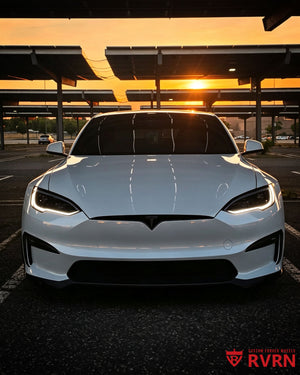 Front sunset view of a 2022 Tesla Model S on RVRN RV-C081 custom forged wheels with matte black finish and carbon fiber wrapping lip.