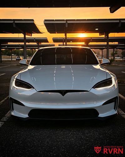 Front sunset view of a 2022 Tesla Model S on RVRN RV-C081 custom forged wheels with matte black finish and carbon fiber wrapping lip.