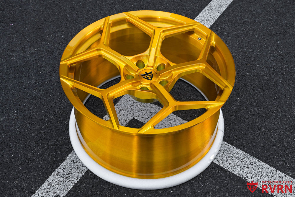 Front angle of RV-MC491 Aston Martin brushed gold wheel, 22x10.5 +40MM on 2023 DBX 707, Y-spoke design