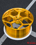 Side view of 22x11.5 RV-MC491 forged Aston Martin wheel with brushed gold finish on DBX 707