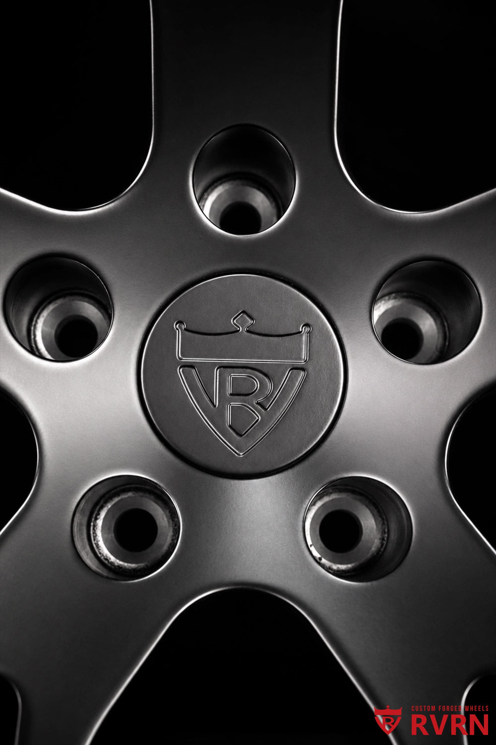 Detailed view of matte black Corvette C8 wheels with RVRN RV-MC24 forged Y spoke design and performance styling
