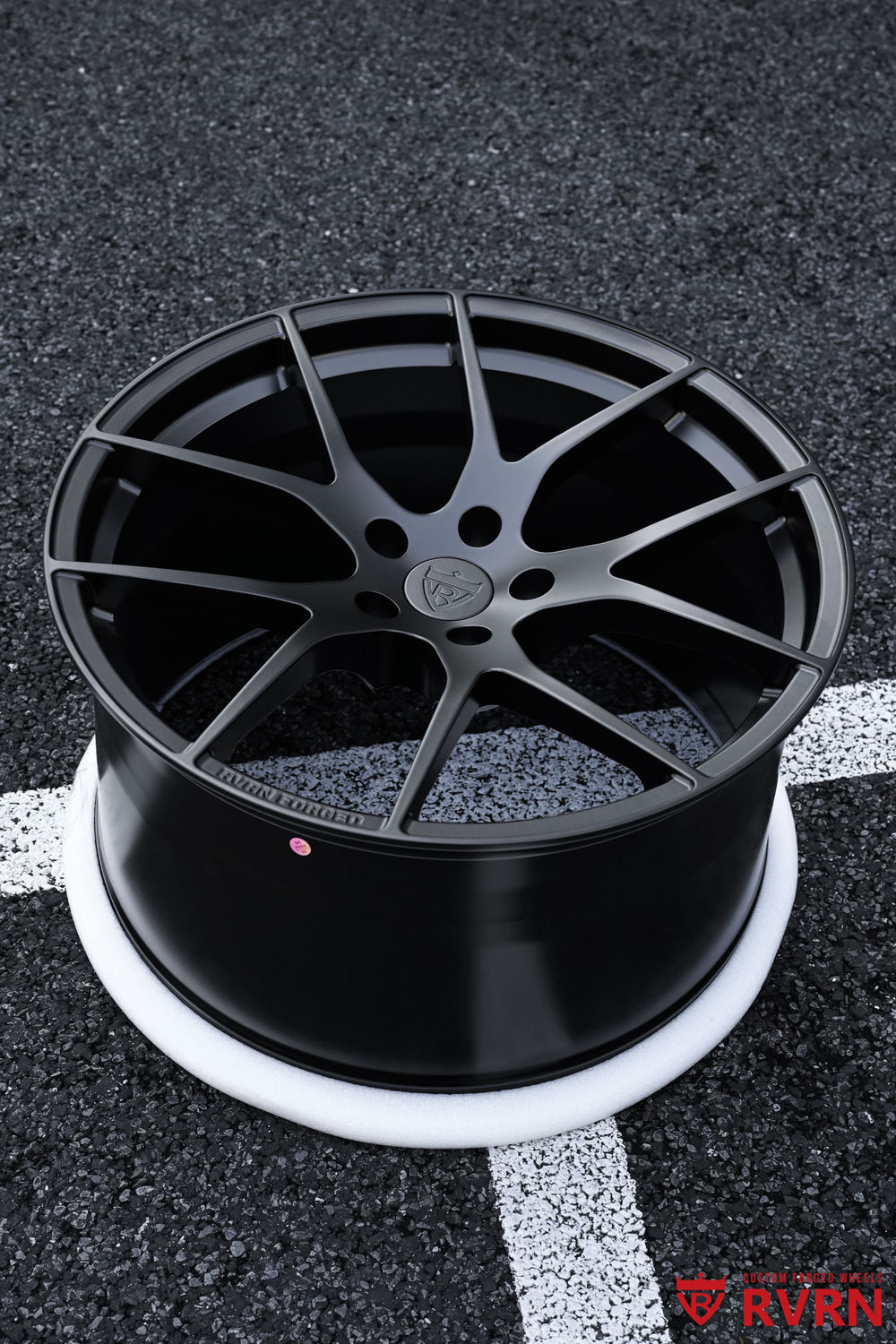 Side profile of 2023 Chevrolet Corvette C8 with custom RV-MC24 forged wheels in matte black finish, 20x9 and 21x12 setup