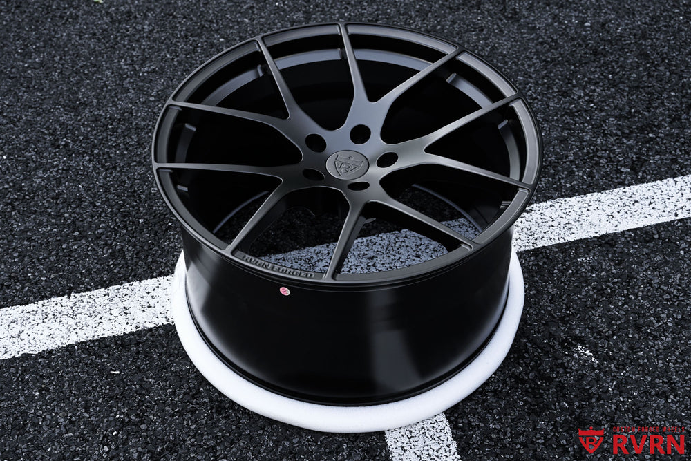 Front view of 2023 Corvette C8 on RVRN RV-MC24 matte black Y spoke forged wheels, custom 20x9 front and 21x12 rear fitment
