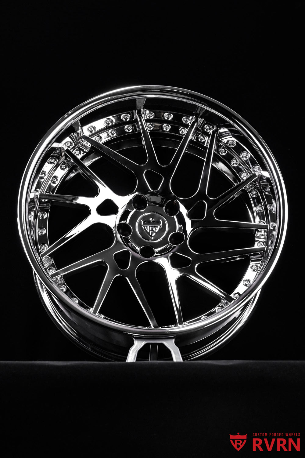 Close-up of RVRN RV-DC11 chrome forged wheel for a 2023 Corvette C8 Stingray, showing the custom wheel design and polished chrome finish
