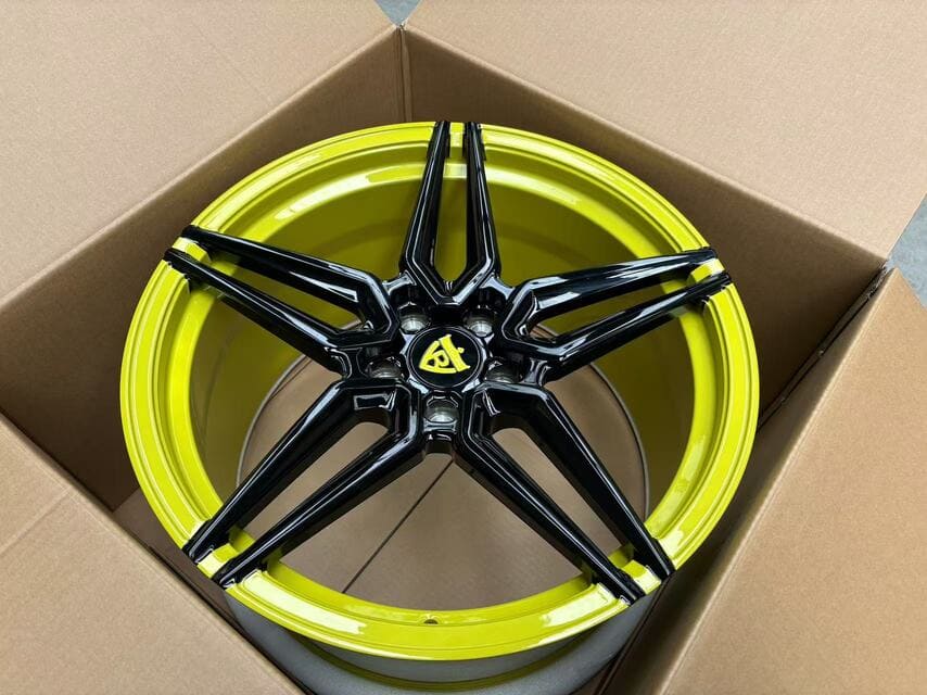Rear 20x11 RV-MR02 forged rim setup with a bold stance and custom yellow finish.