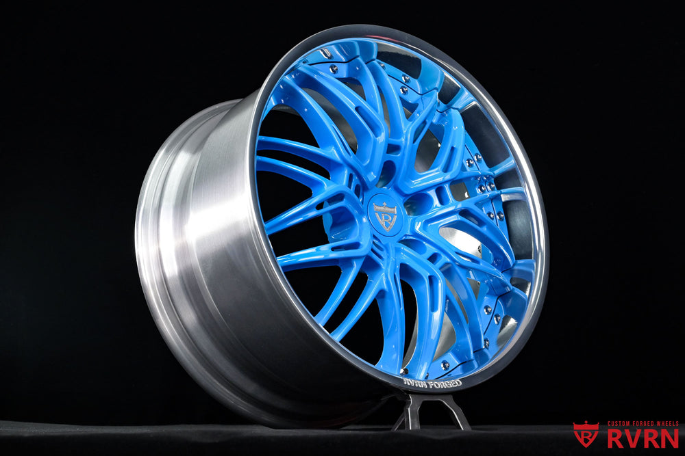 Close-up detail of Rapid Blue spokes on RVRN RV-T081 custom forged wheels for the 2023 Corvette C8 Stingray, paired with polished aluminum barrels