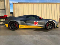 Front angle of custom forged red and black C8 Z06 wheels