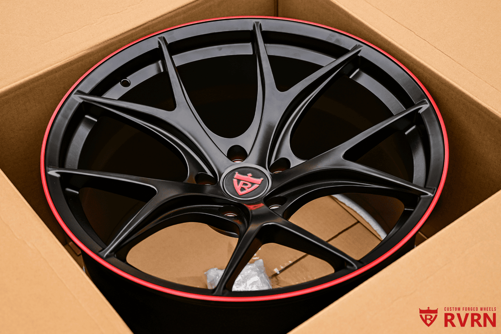 Detail of red accent on custom Corvette C8 wheels