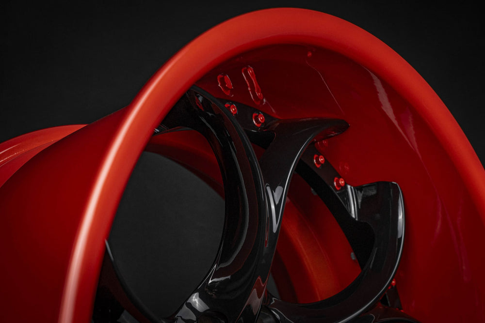 Design your own wheels: orange spoke with black hardware details