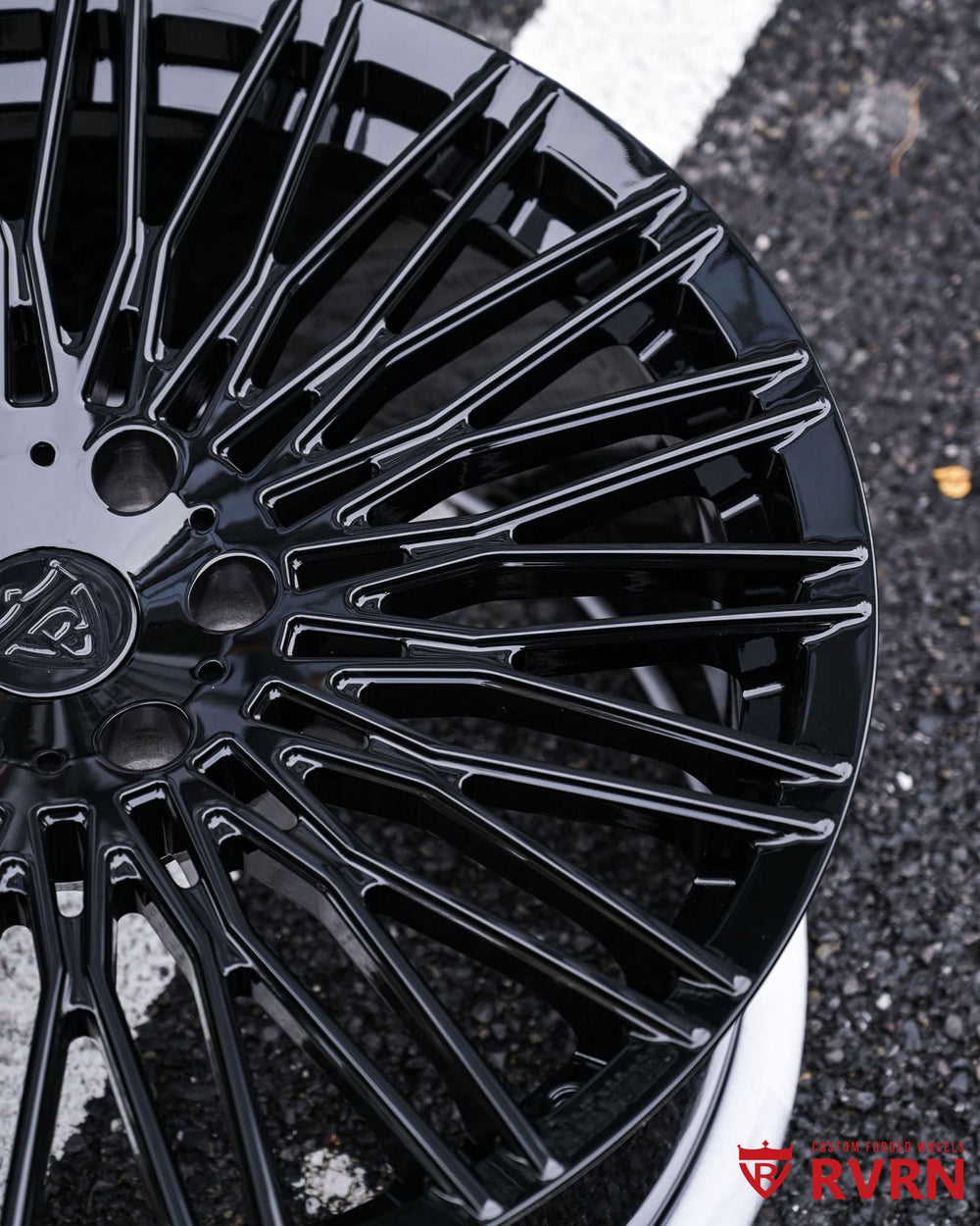 Multi-spoke gloss black forged wheel for performance trucks and Shelby builds.