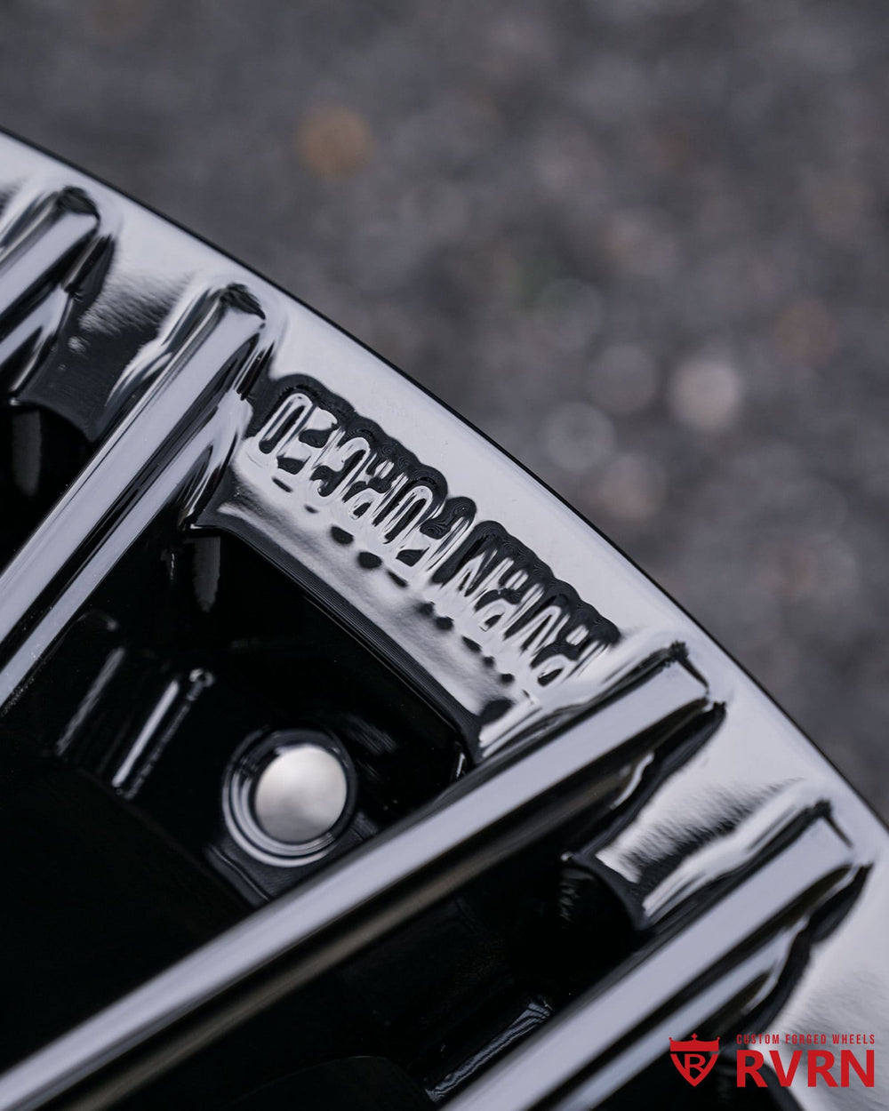 Detailed close-up of multi-spoke gloss black MC22 forged wheel for Shelby Super Snake.