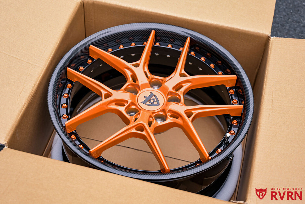 Close-up of solar orange pearl spokes on RV-DR08D forged wheels for Subaru WRX