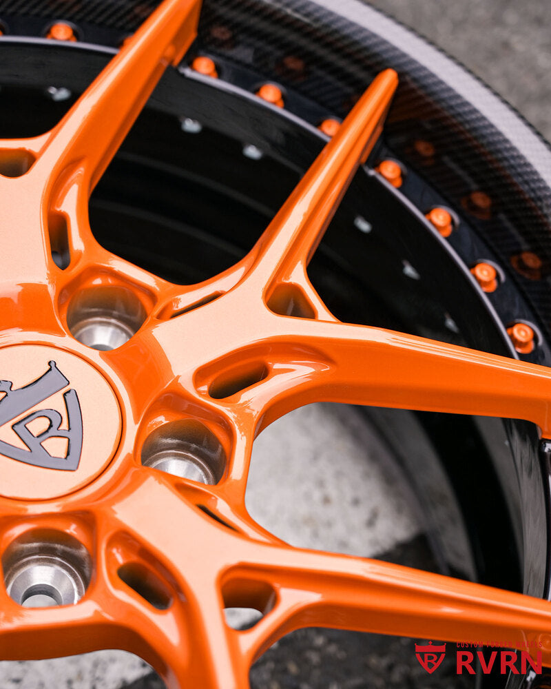 Rear view of RV-DR08D forged wheels on Subaru WRX, custom orange and black