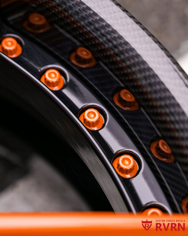 Detailed shot of Subaru WRX Solar Orange Pearl spokes on RV-DR08D wheels