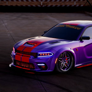 Dodge Charger with purple and black custom paint and 22-inch deep dish RVRN forged wheels.