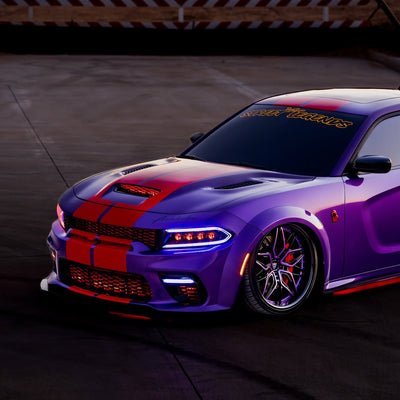 Dodge Charger with purple and black custom paint and 22-inch deep dish RVRN forged wheels.