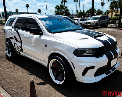 2023 Dodge Durango Hellcat on RVRN RV-DF14 2-piece custom forged wheels in Ivory White Barrel with Matte Black Spoke, front three-quarter view with racing stripes and red calipers before widebody install.