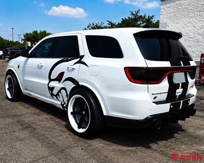 2023 Dodge Durango Hellcat on RVRN RV-DF14 custom forged wheels with ivory white barrels, rear three-quarter view showing the Hellcat graphic and widebody flares before install.