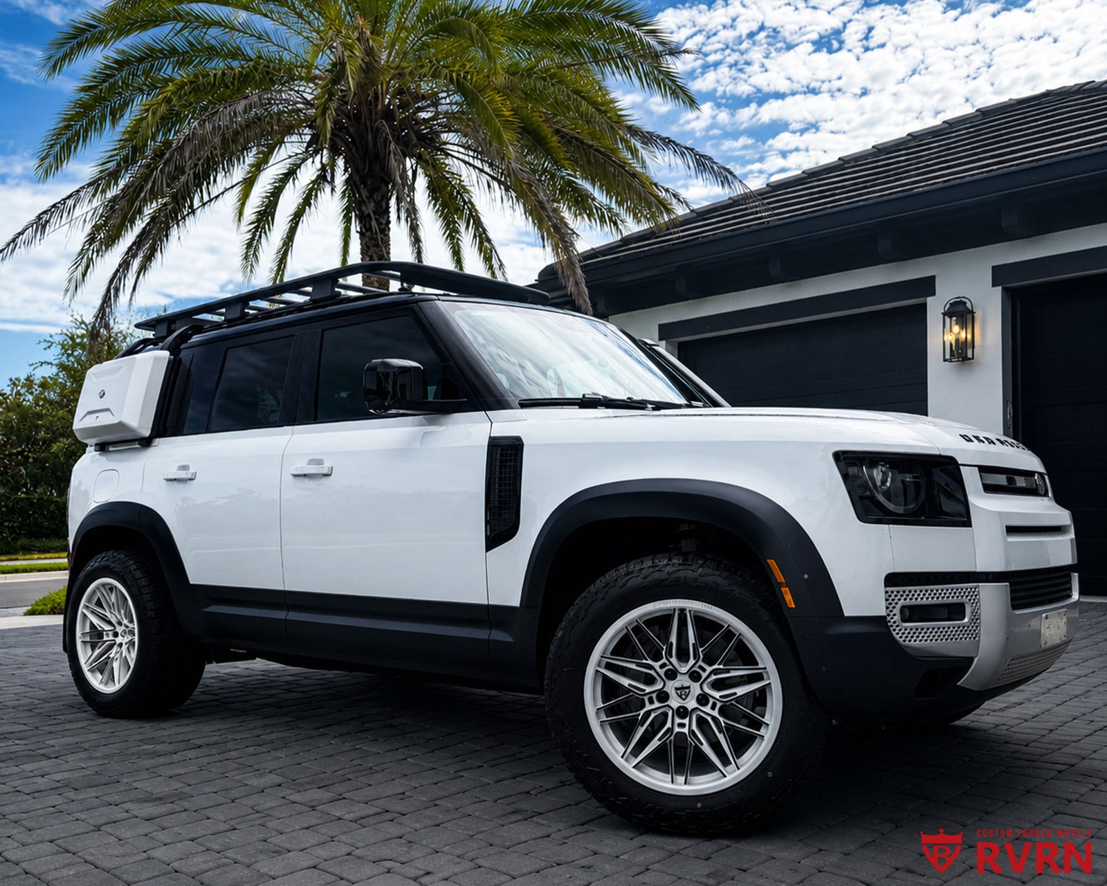 2023 Land Rover Defender 110 with RV-MS808 custom forged monoblock wheels in gloss black face and pearl white finish